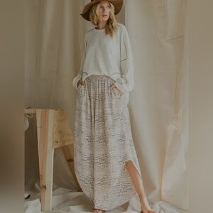 Bucket LIST PRINTED SMOCKED WAIST PANTS WITH ASYMMETRICAL HEM